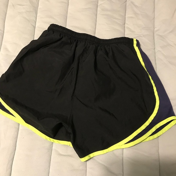 Small black Nike running shorts with highlighter yellow and dark purple. - Picture 3 of 3